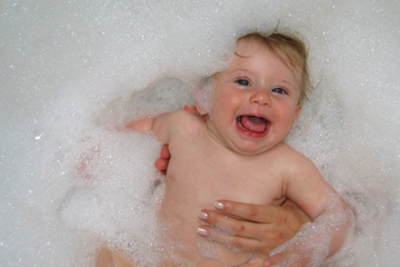 a baby in a bathtub