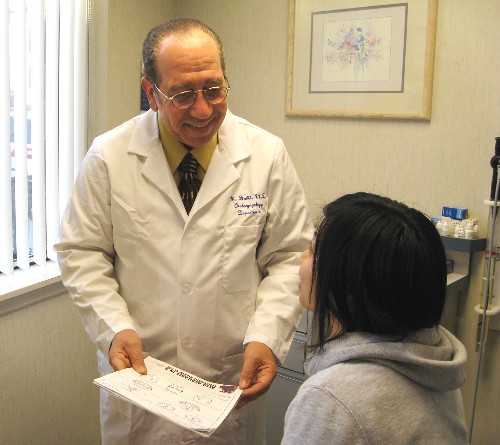 Dr. Mohsen Habib talking to patient