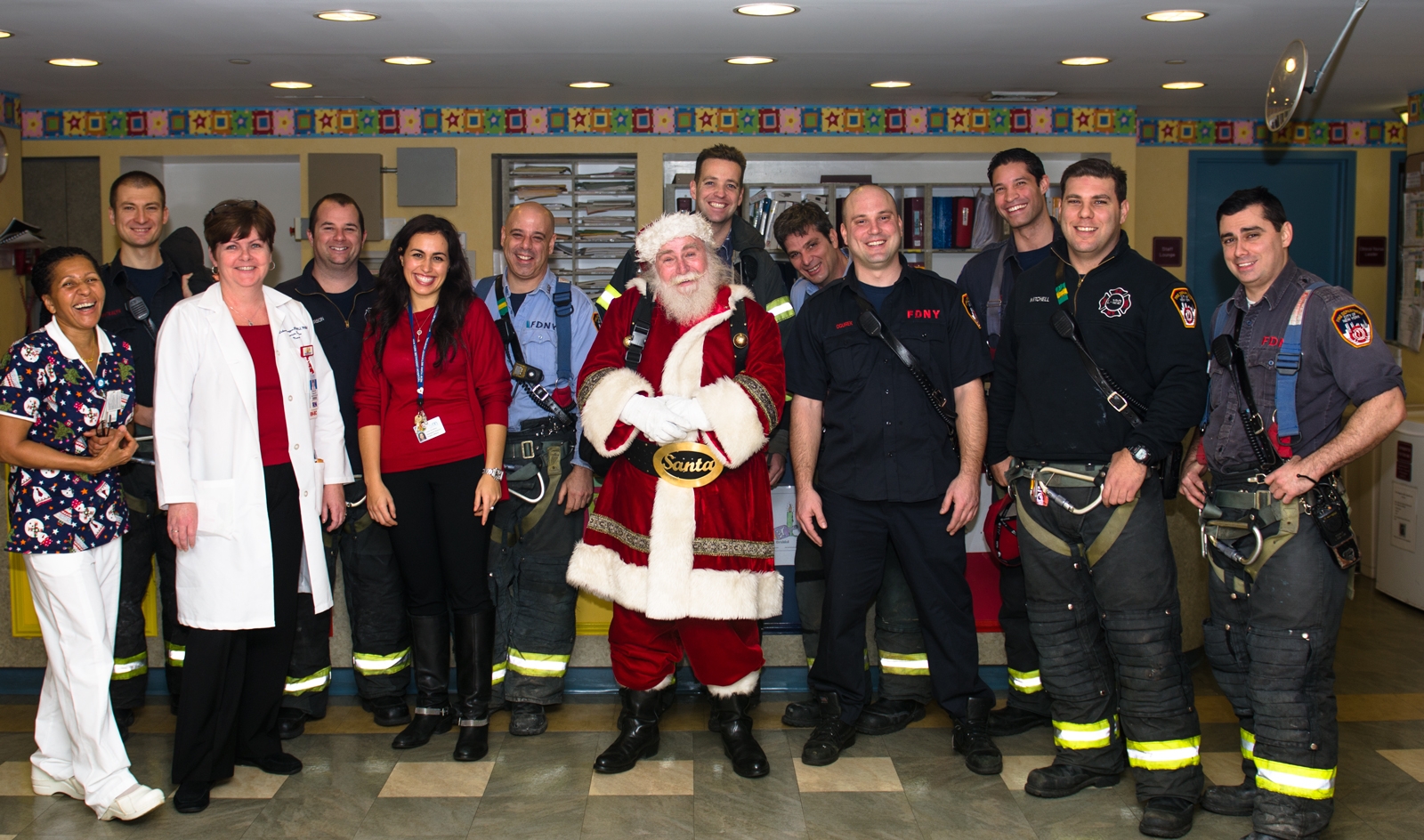 NYM staff, Santa, and Firefighters