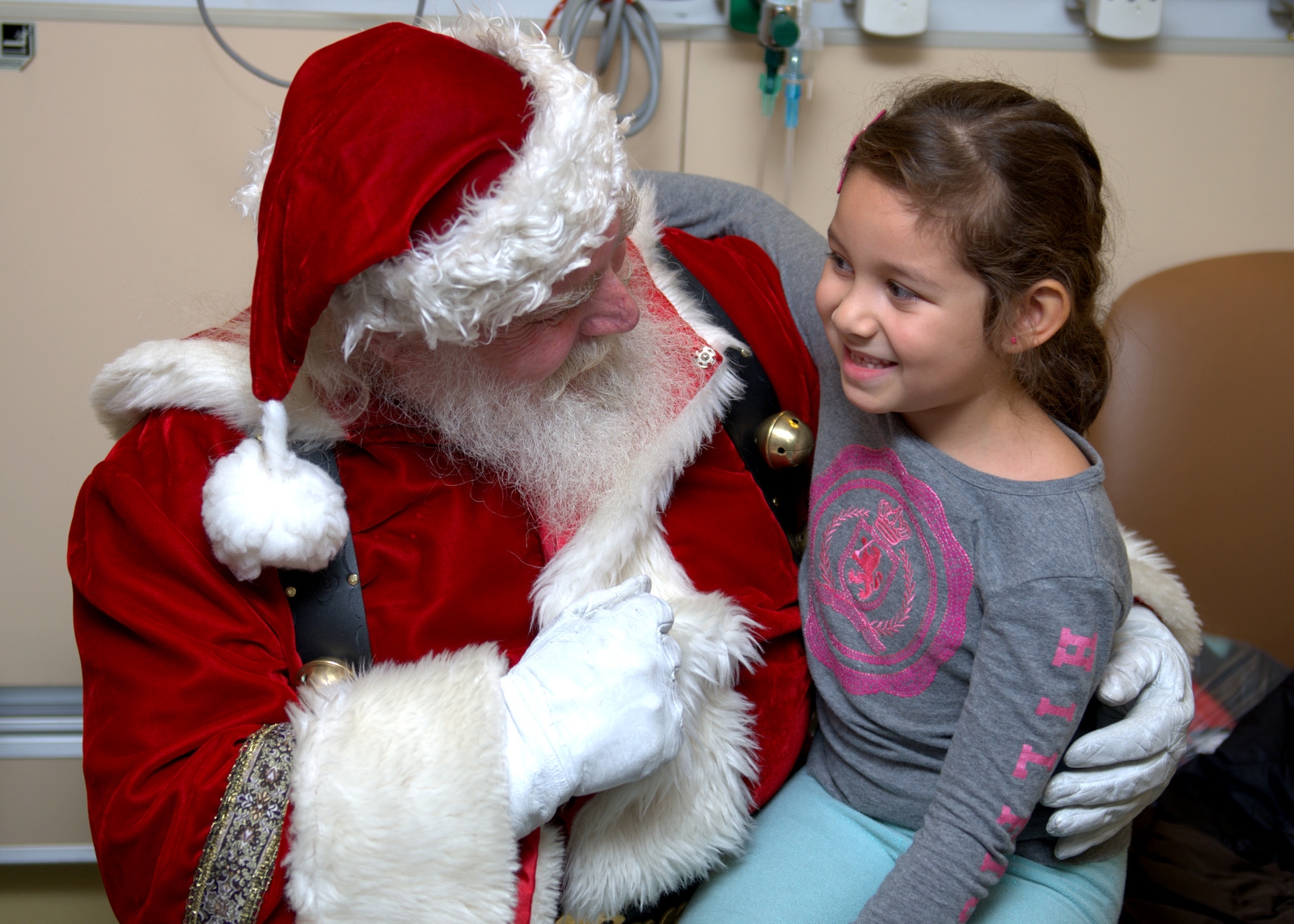 Santa with patient in NYM Pediatric Emergency Room