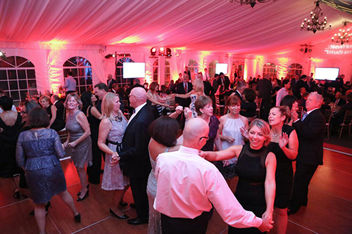 A group of people dancing at a gala