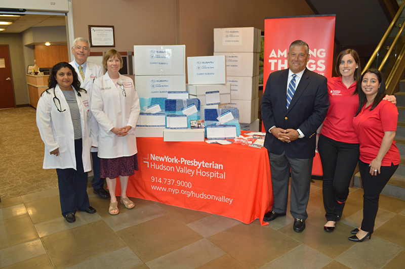 Photo of Dr. Namrata Patel, Medical Director, NewYork-Presbyterian/Hudson Valley Hospital’s Cheryl R. Lindenbaum Comprehensive Cancer Center; Dr. Martin Oster and Dr. Elizabeth Tapen, both of the Cancer Center; Brad R. Candullo, General Manager of Curry Automotive; and Courtney Rinaldi and Antonella Leone-Giamei of The Leukemia & Lymphoma Society