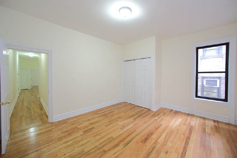 a room with white doors and walls at 600 West 169 Street