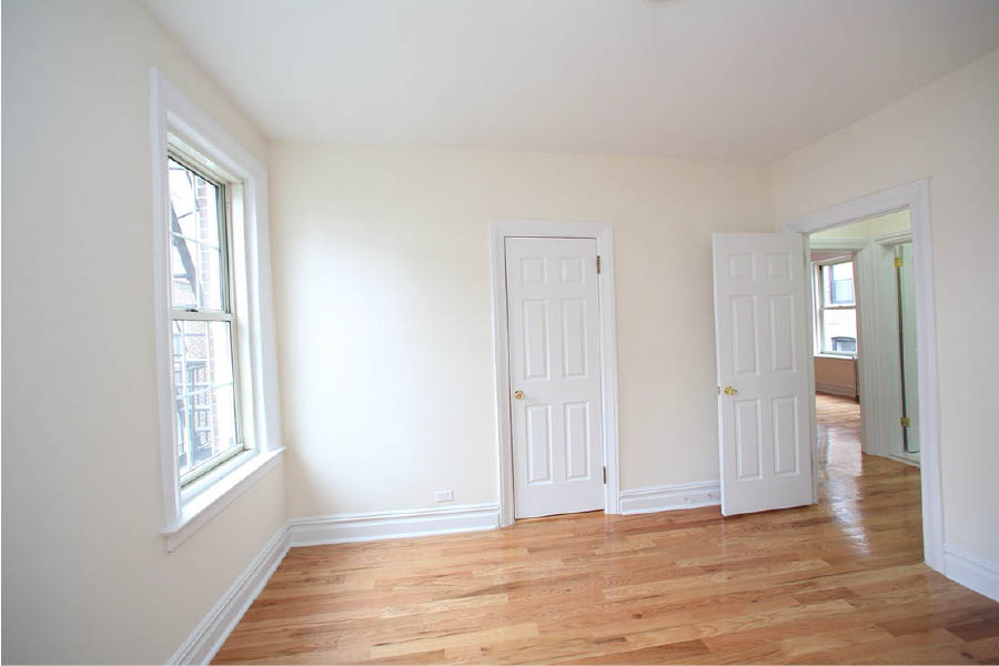 a room with white doors at 625 West 169 Street