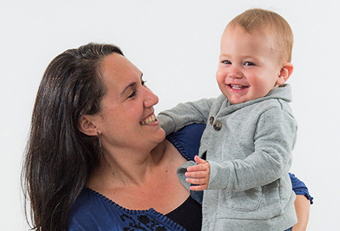 a person holding a baby