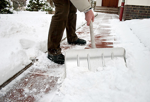 a person shoveling snow