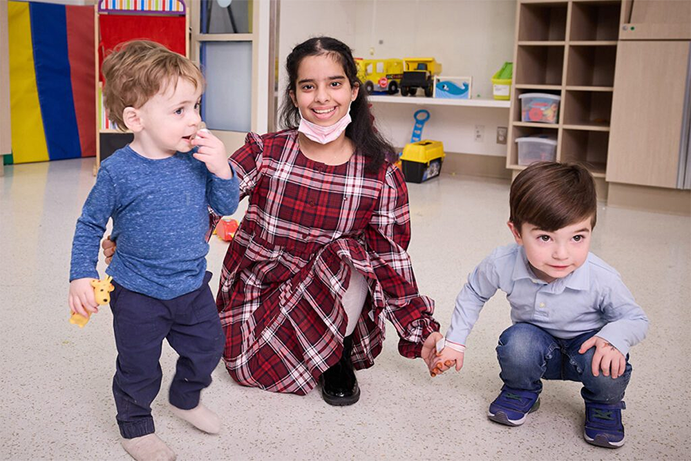 Two small boys and a little girl.