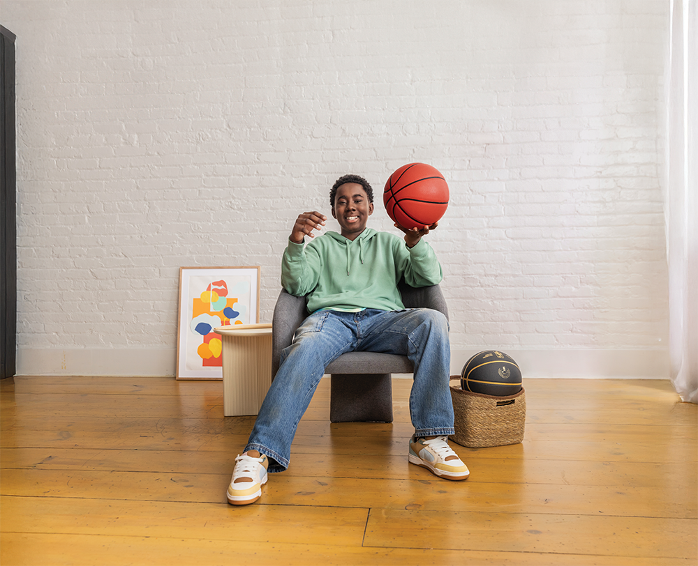 Teen boy with a basketball.