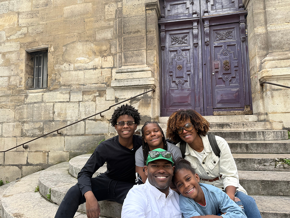 Group of friends on steps.