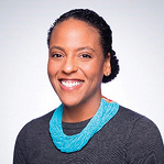 A woman with a turquoise necklace.