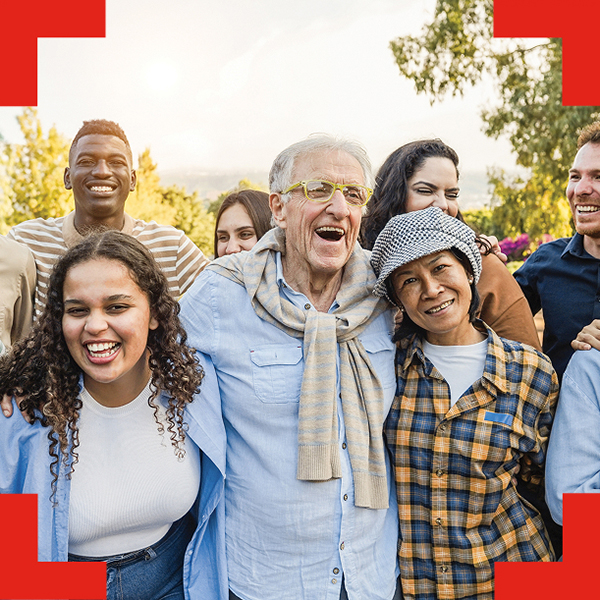 Multi-generational group smiling.