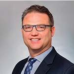 A man in a suit and tie.