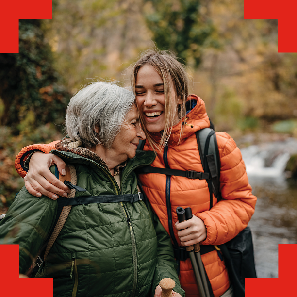 Two women, one older, one younger, hiking.