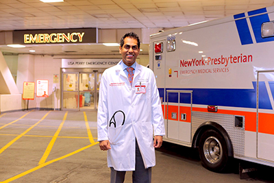 image of Dr. Sharma in front of emergency room