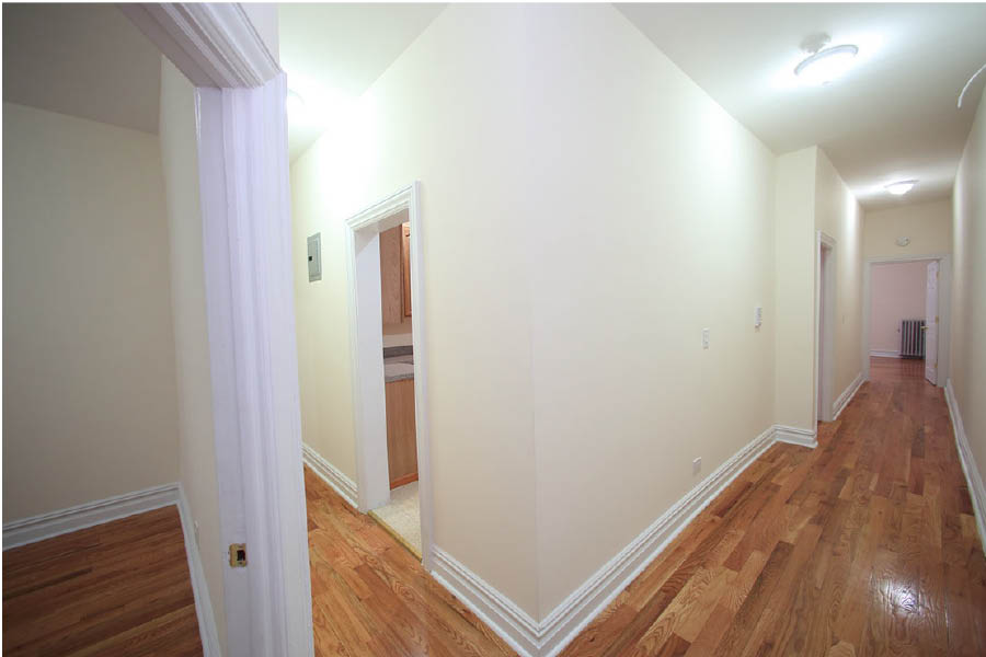 a hallway with white walls at 600 West 169 Street