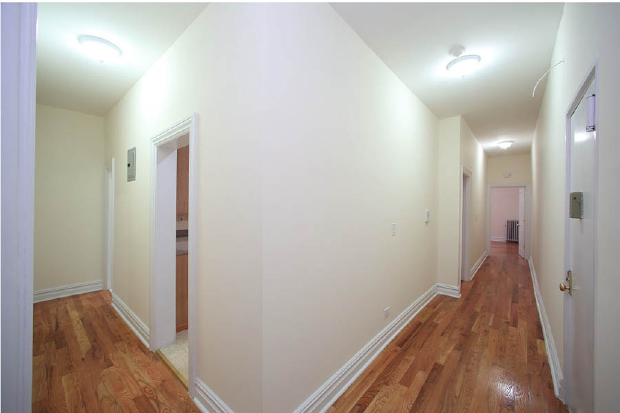 a hallway with white walls at 600 West 169 Street