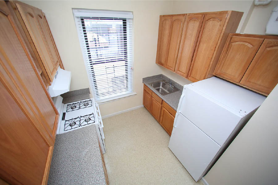 a kitchen with a sink and cabinets at 601 West 164 Street