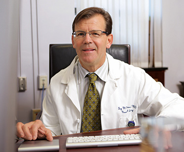 Dr. Guy M. McKhann