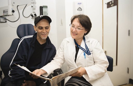 A doctor explaining information to a patient
