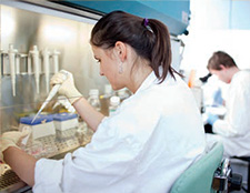 researcher using her equipment