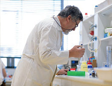 researcher using his equipment