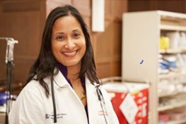 Dr. Mara Minguez smiling for a photo