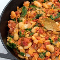 photo of tomato and cannellini bean stew spinach