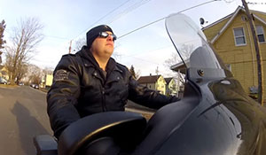 Chris Costa riding his motorcycle