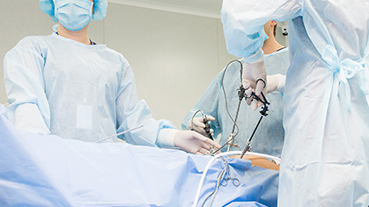 image of doctors and surgeons performing a surgery