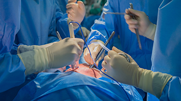 image of surgeons doing heart surgery