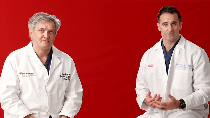 Two doctors discussing neck and back pain relief.