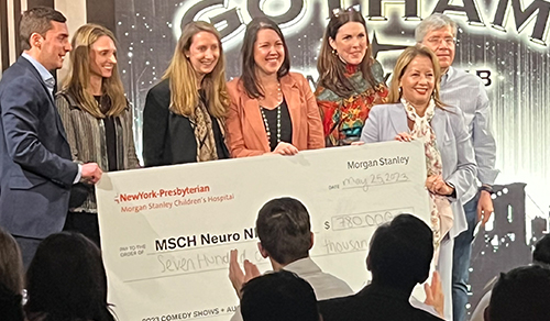 Morgan Stanley Children's Hospital receiving a check