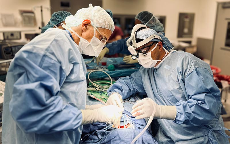 image of Dr. Mark Souweidane and Dr. Gary Kocharian doing surgery