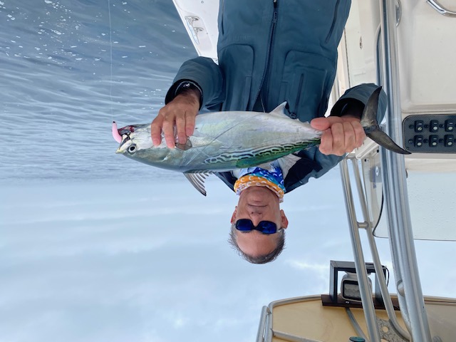 Dr. Chabot holding a false albacore fish