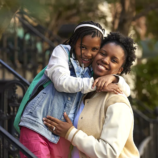 Parent and child smiling