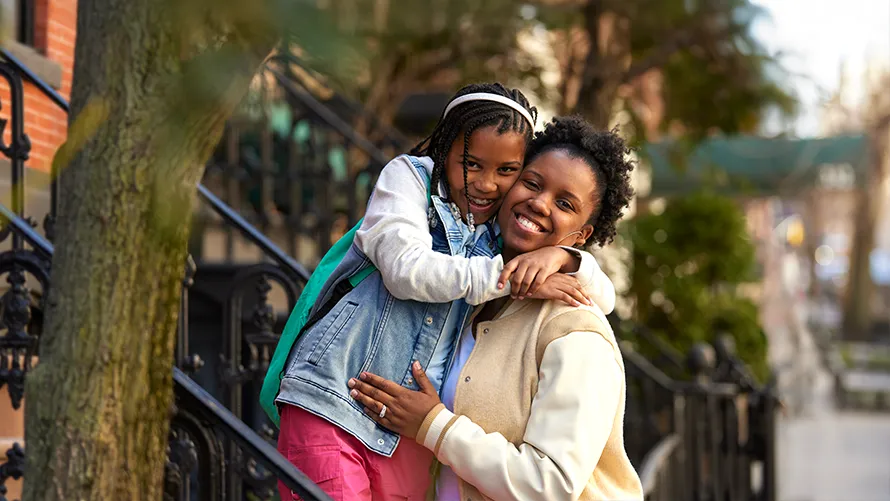 Parent and child smiling