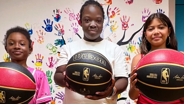 kids with basketball in their hands