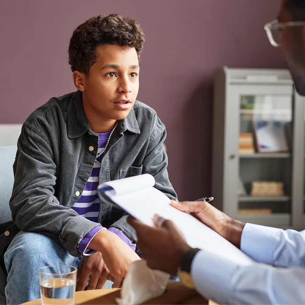 teengager speaking with a doctor