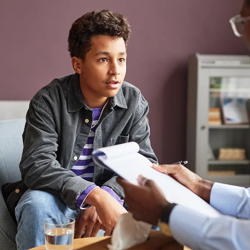 teengager speaking with a doctor