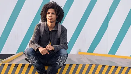 young girl sitting on a staircase