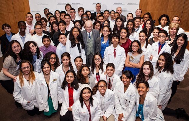 Program founder Eugene Lang with a group of scholars