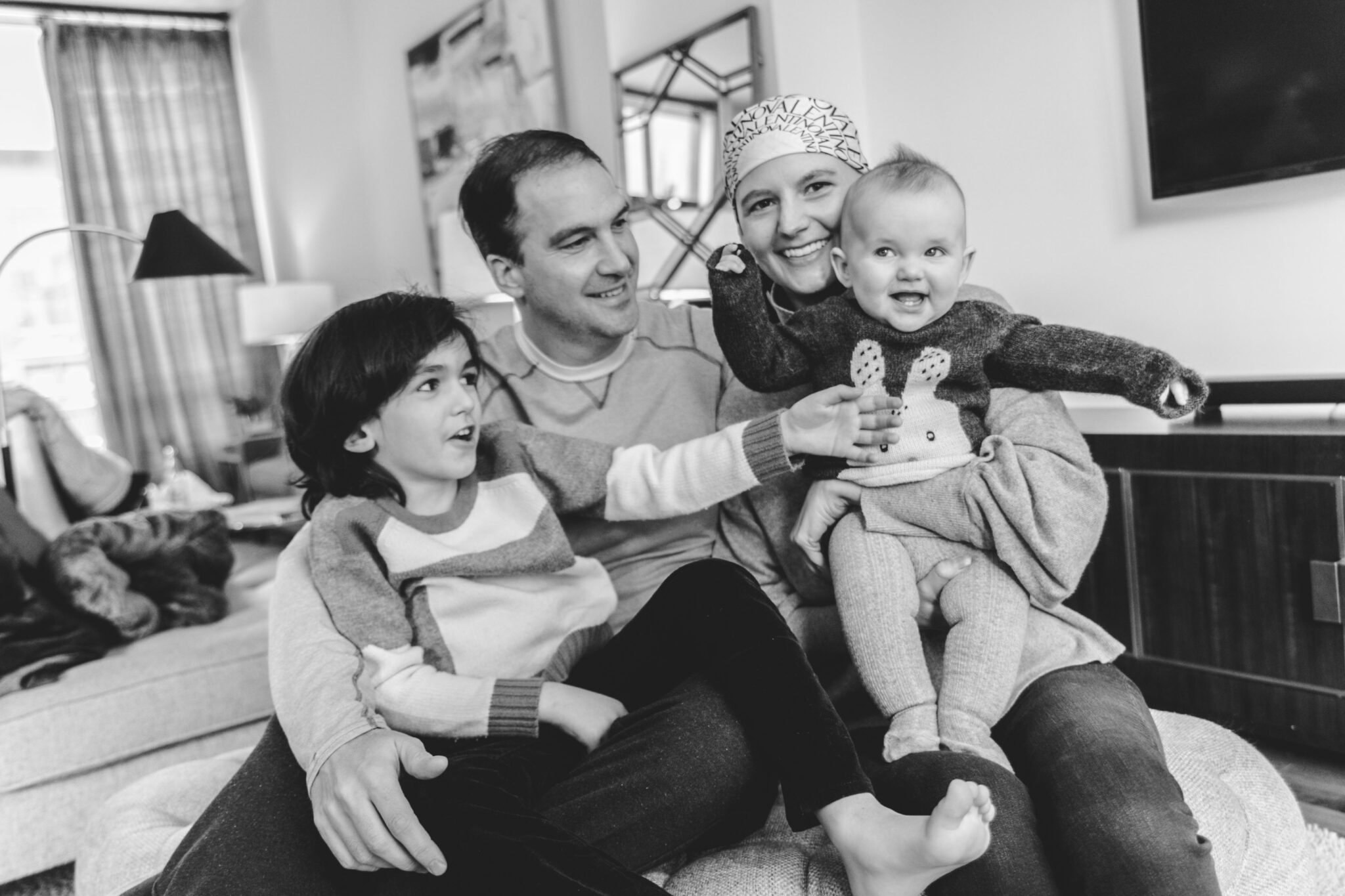 Kiley and her family early in her treatment journey. Pictured, left to right: son DJ, husband David, Kiley, and daughter Maddy