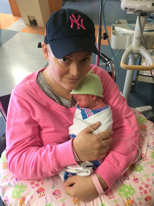 image of Kristin with Emma in the NICU