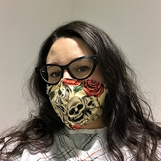 image of Elizabeth wearing a mask