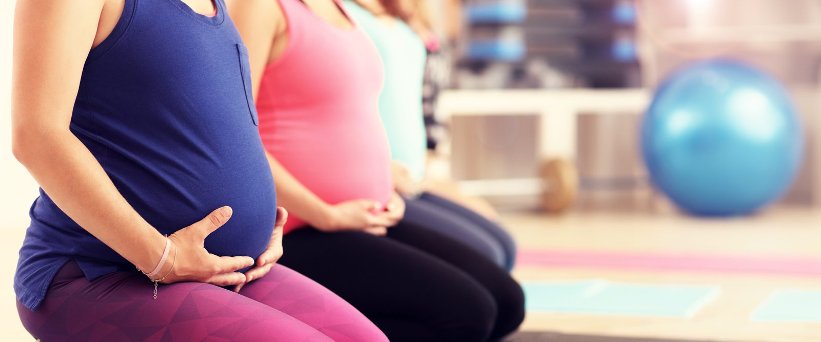 Pregnant women doing exercises.