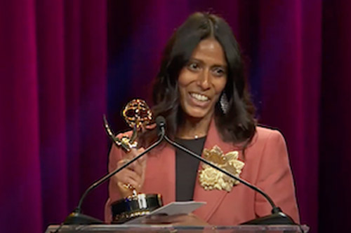 Devika Mathrani, senior vice president and chief marketing and communications officer of NewYork-Presbyterian, accepts the Emmy Award for best commercial.