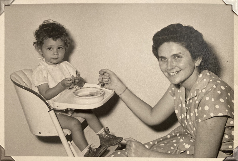 Judith Diamant feeds her daughter, Sarah, in May 1959 at their home in Nairobi, Kenya.