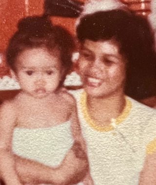 Jo Marie as a child, with her mother, Theresa.