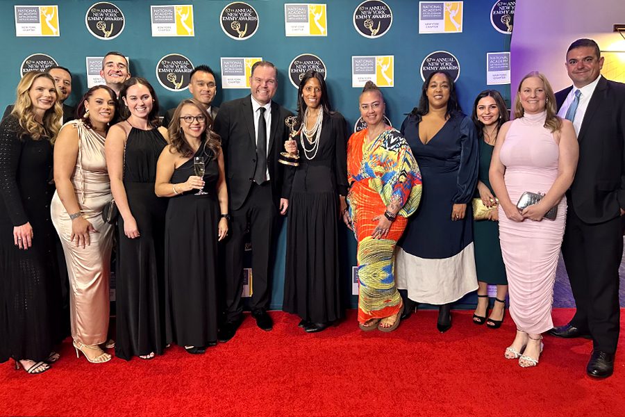 Devika Mathrani (center), NewYork-Presbyterian’s chief marketing and communications officer, celebrates with members of the marketing and communications team and Havas New York.