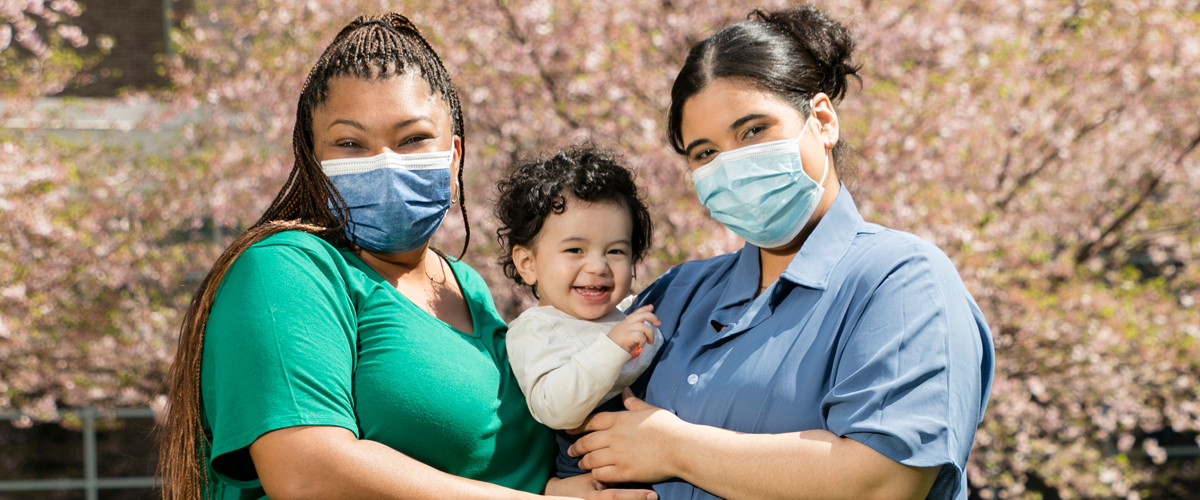 Doula Sharonda Gardner, left, with Alondra Guaba and her son, Israel.